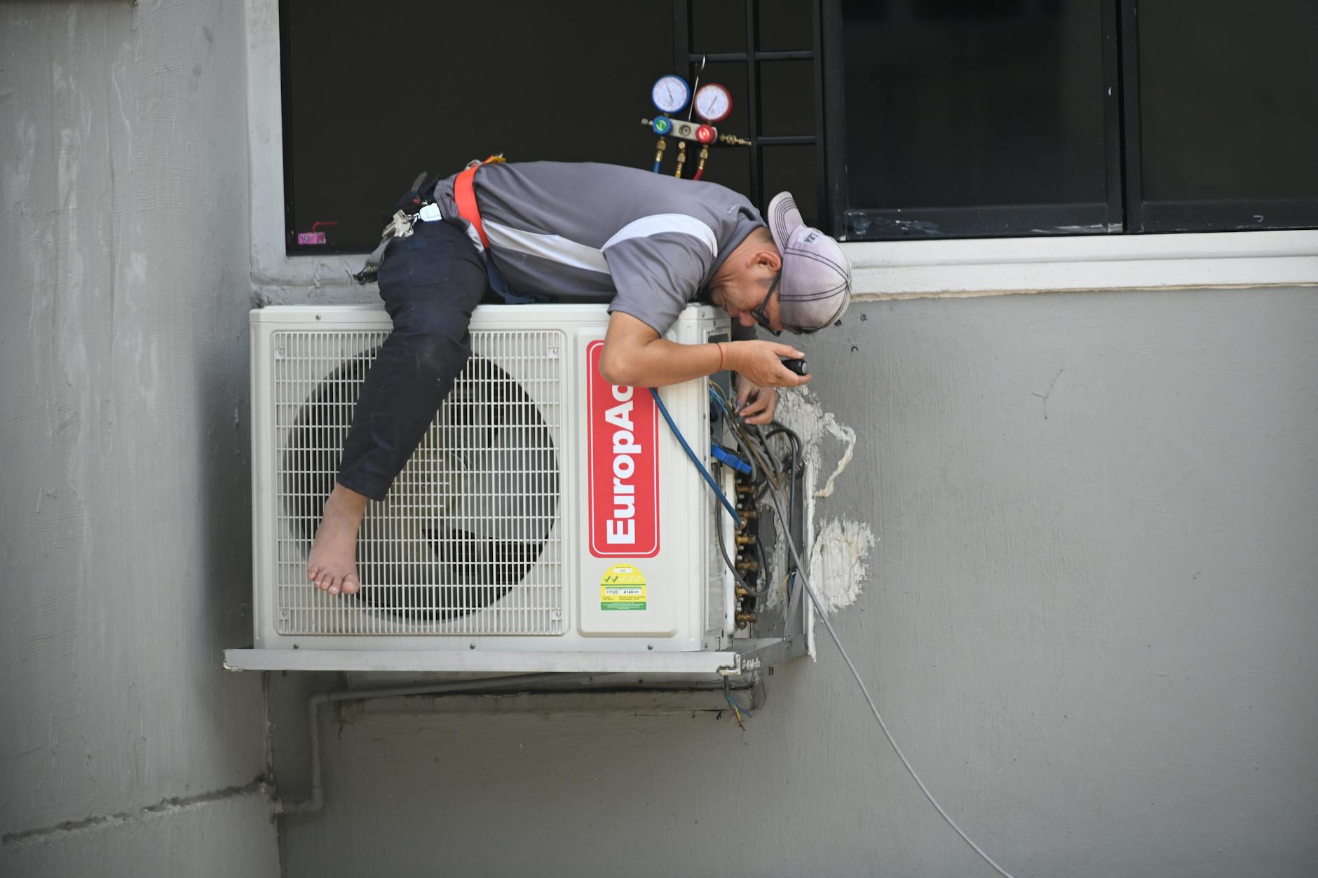 Expert HVAC technician performing maintenance